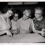 l. to r. Library director Barbara Rau, librarian Carol Alric, Marion Bardole and Mary Wasserbach examine blueprints for the new library building, 1970. (Bethlehem Public Library archives)